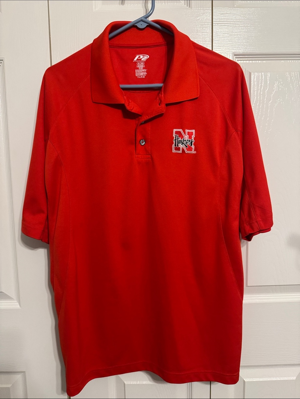 Pro Player Red Polo with Nebraska Huskers Chest Logo